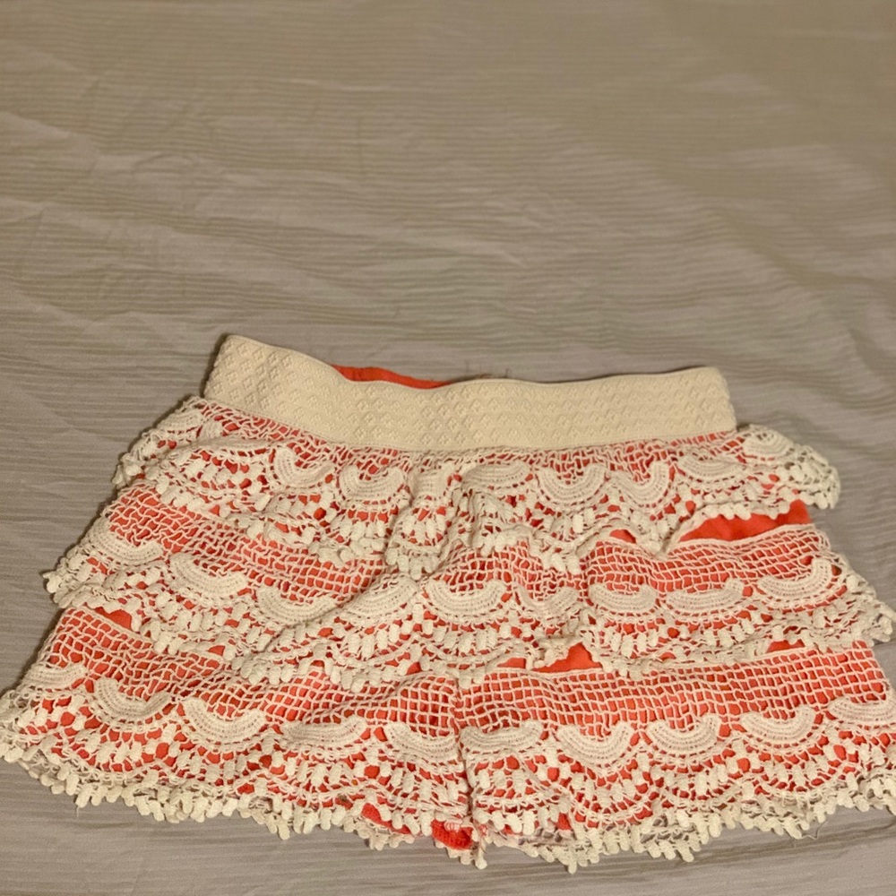 coral/white lace shorts